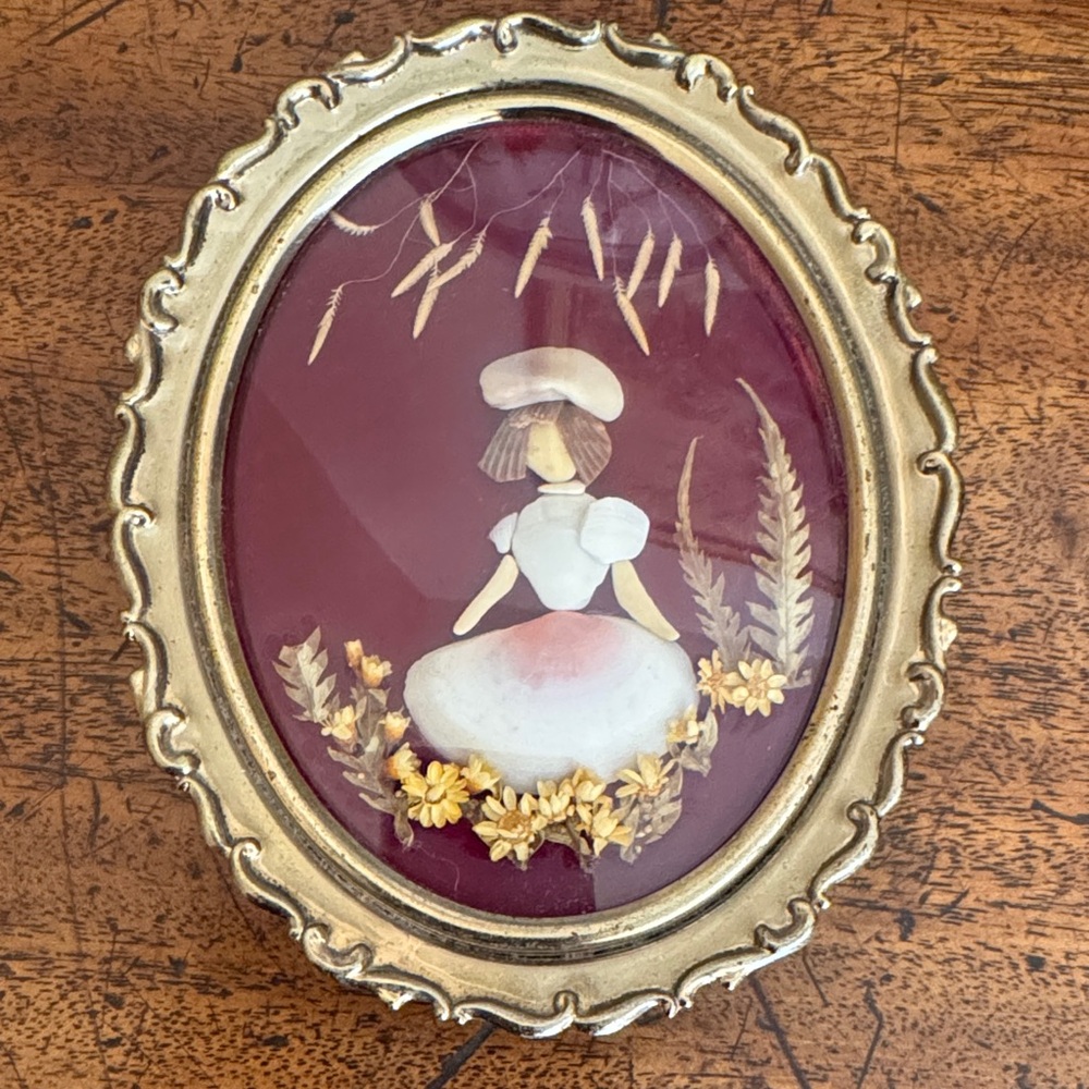 Vintage Shell Art Girl in Oval Gold Frame - Burgundy Background